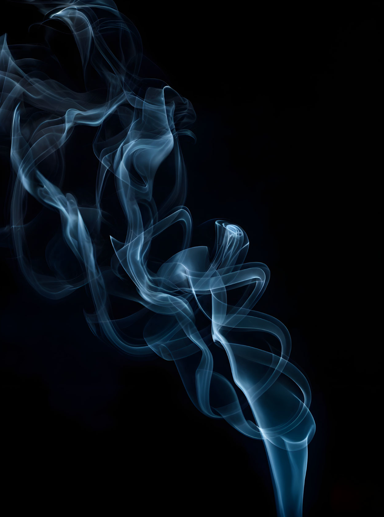 Blue smoke swirling elegantly on dark background