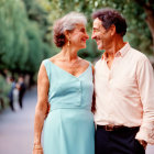 Elderly couple in park: Woman in blue dress, man in pink shirt