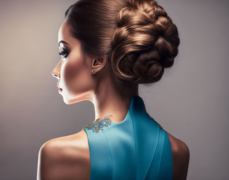 Sophisticated woman side profile with braided updo and blue dress