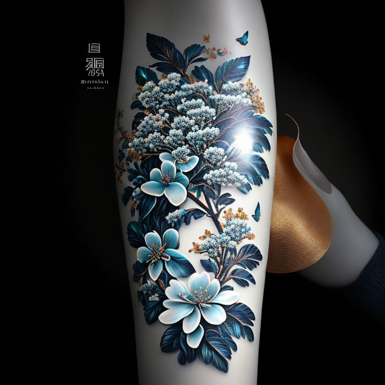 Detailed floral tattoo design: white and blue flowers, lush foliage, small birds on mannequin leg