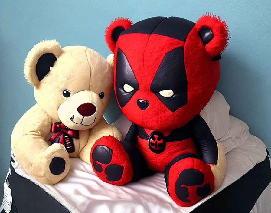 Classic teddy bear and red-and-black character bear plush toys against blue wall