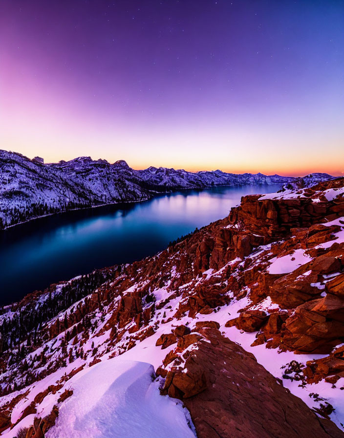 Snow-covered Mountain Landscape at Twilight with Purple and Orange Sky