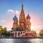 Colorful Spired Castle on Island Bridge at Sunset