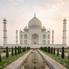 Panoramic view of Taj Mahal in rain shower with overcast skies