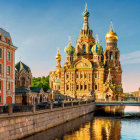 Colorful cityscape with ornate building, canal, bridge, and markets under blue sky