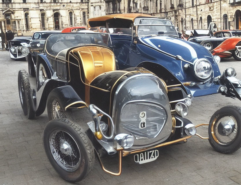 Classic Blue Vintage Cars Displayed on Cobblestone Square