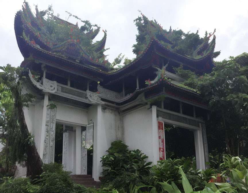 Ornate Asian-style Pavilion in Lush Green Setting