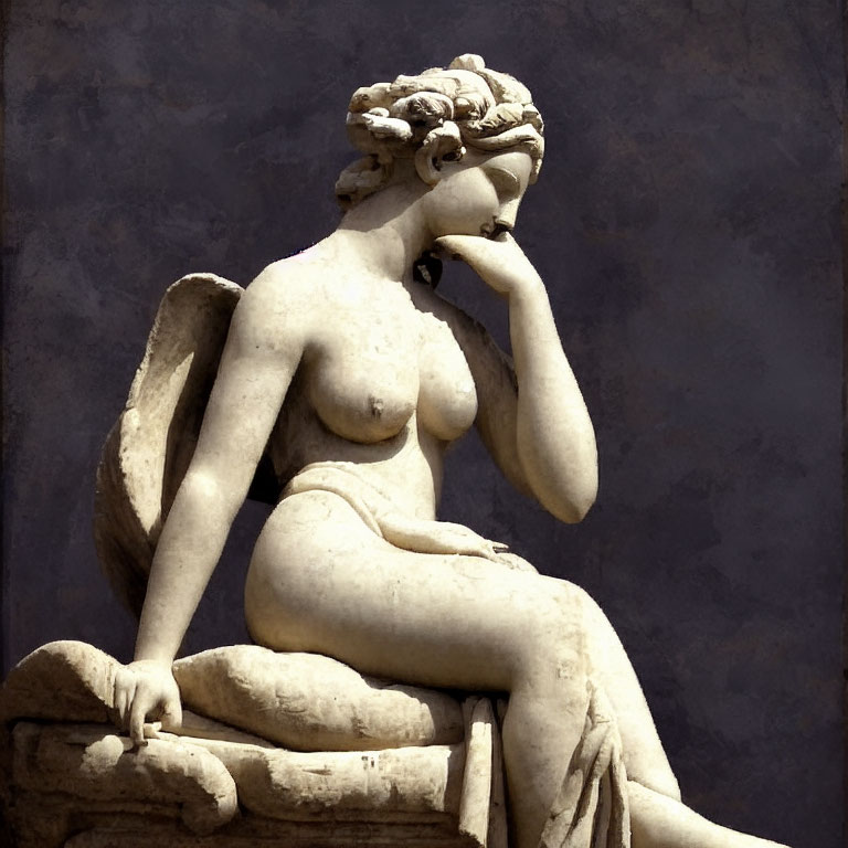 Classical statue of seated woman in draped clothing on textured background