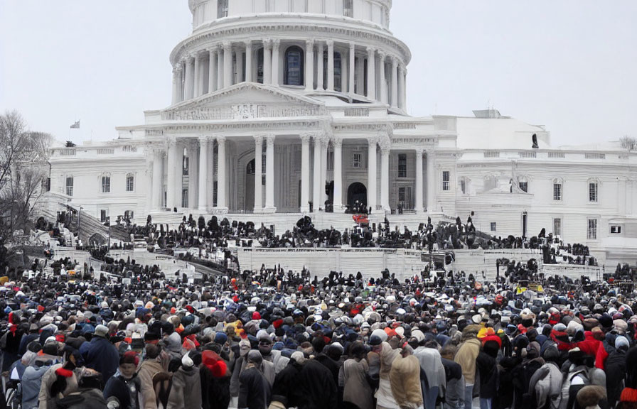 Crowd gathers in front of Capitol Building for event.