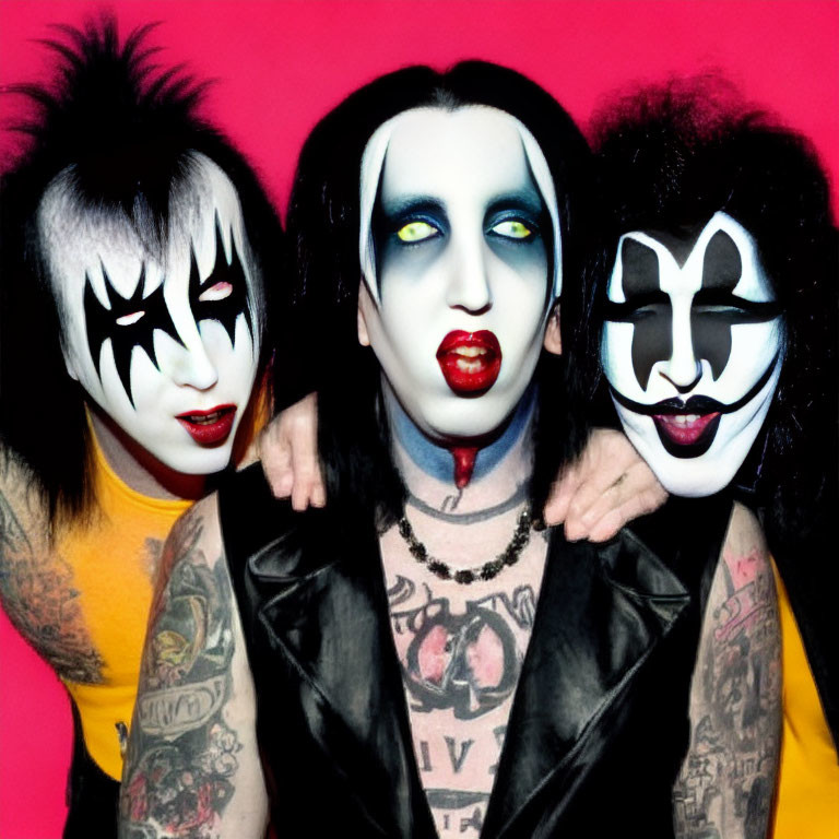 Three individuals with KISS-inspired makeup on pink background