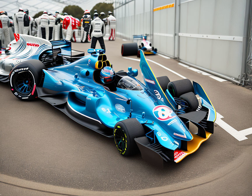 Blue open-wheel race car on asphalt track with other cars and drivers ready for race