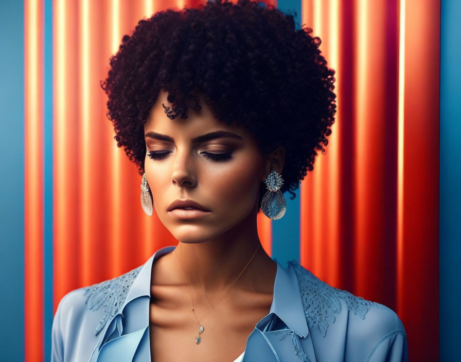 Woman with Afro Hairstyle in Blue Blazer and Large Earrings on Striped Background