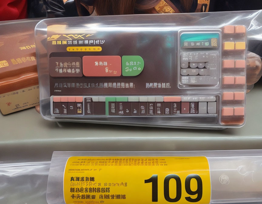 Electronic Device with Numeric Keypad and Asian Characters Displayed