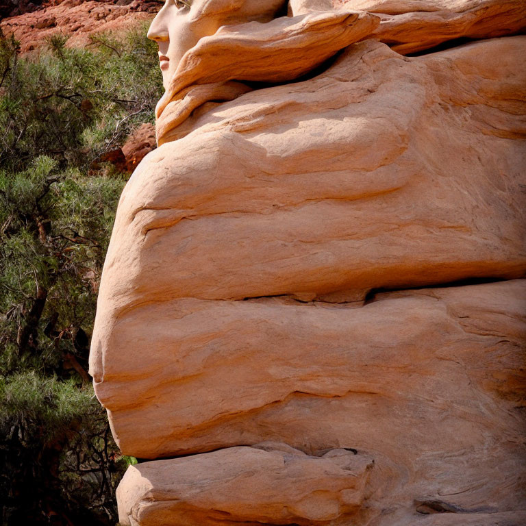 Red Sandstone Cliff with Human-Like Face Sculpted Naturally