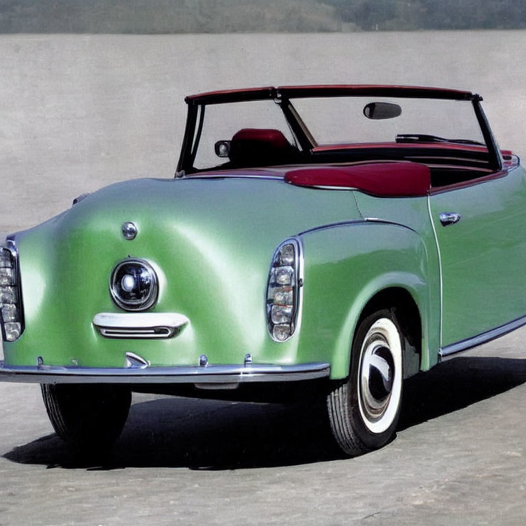 Classic Two-Tone Green Convertible Car with White Sidewall Tires