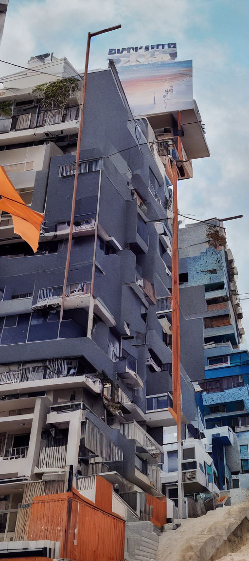 Multi-story Building with External Staircases Next to Construction Site