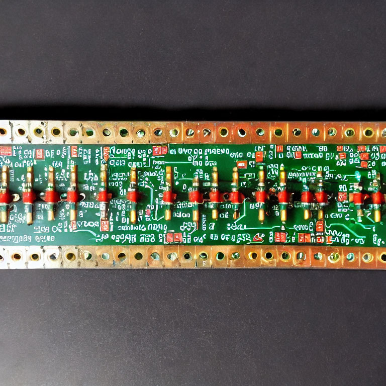 Printed Circuit Board with Electronic Components on Dark Background