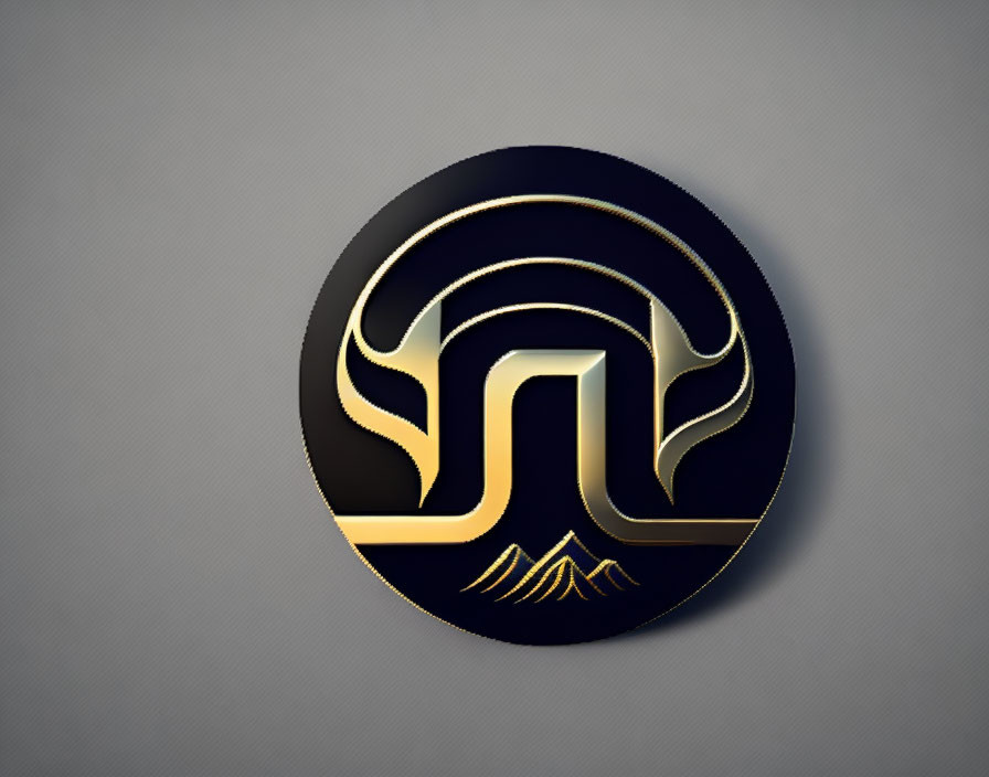 Circular Black and Gold Emblem with Abstract Design on Gray Background