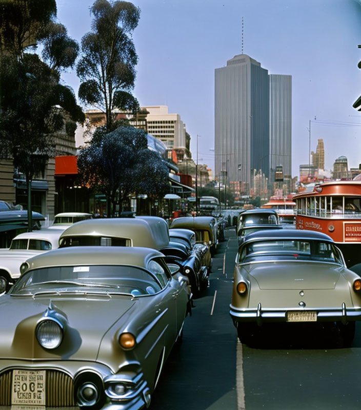 Classic Cars Displayed on Urban Street Amidst Skyscrapers