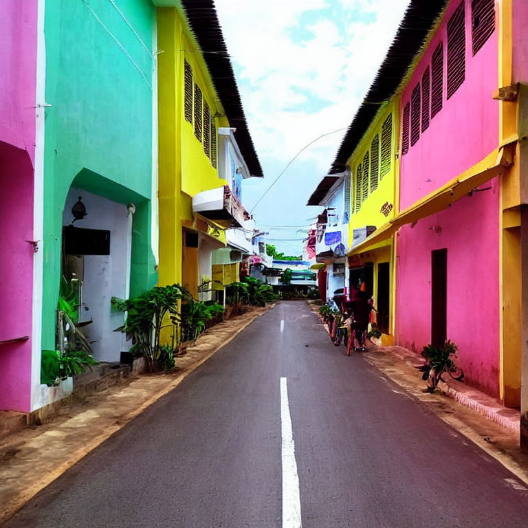 Colorful Street with Pink, Yellow, and Green Houses and Bicycles