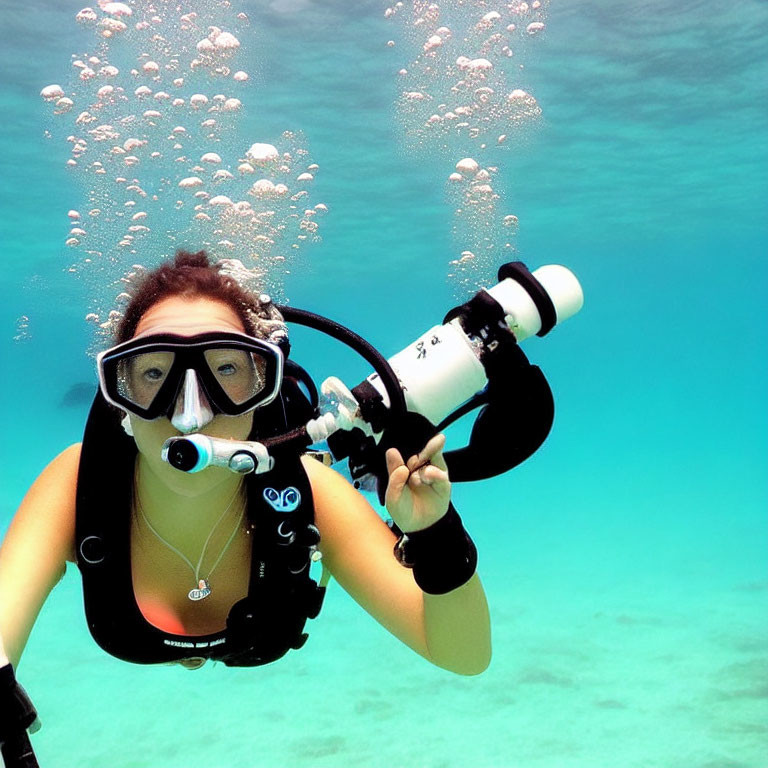 Underwater Diver with Snorkeling Gear Surrounded by Bubbles