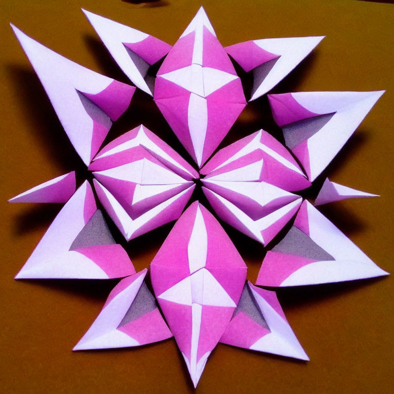 Symmetrical Pink and White Paper Star Design