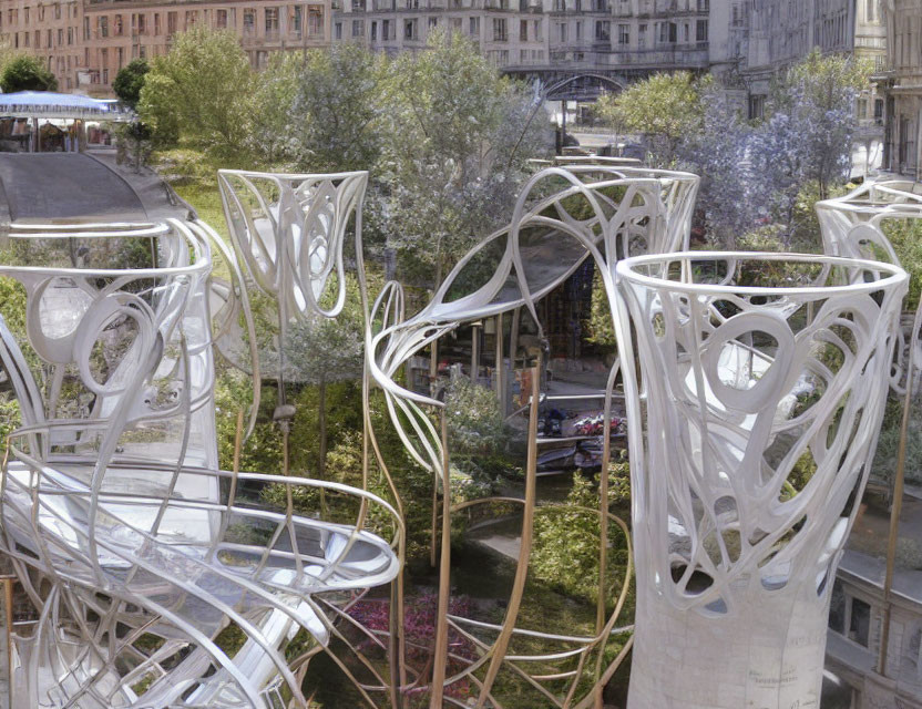 Contemporary white sculptural installation in urban park with organic patterns, trees, buildings, and clear sky