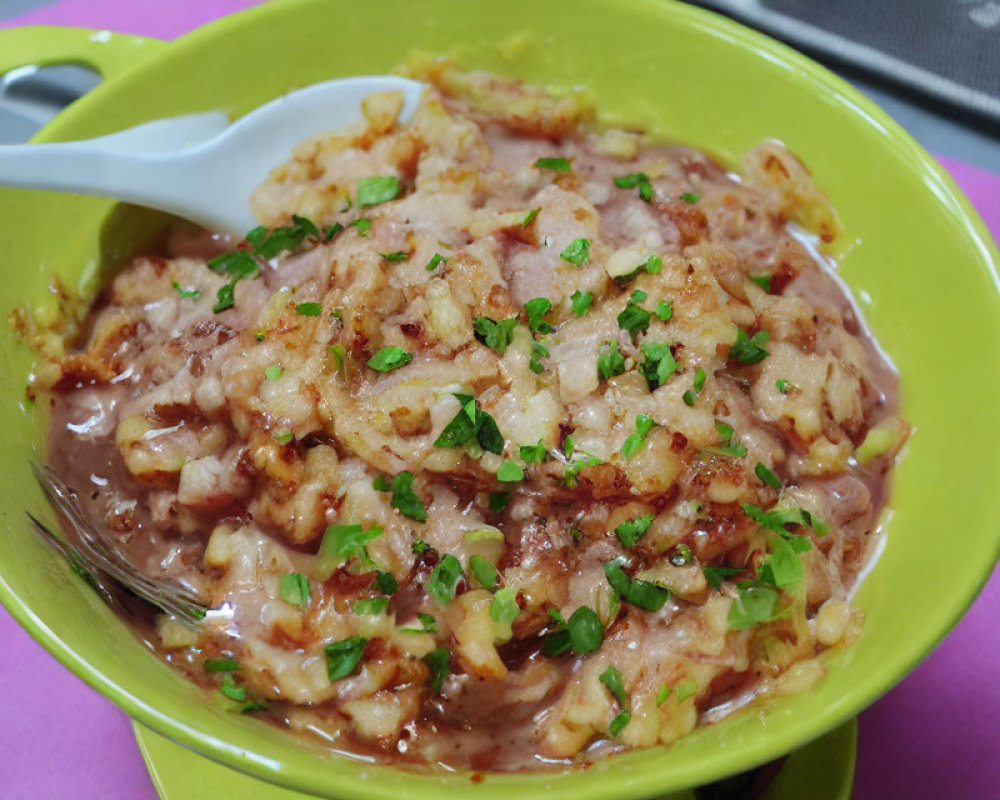 Savory Stewed Dish with Green Herbs and Textured Mix