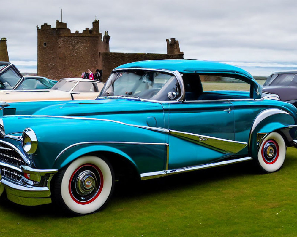 Vintage Teal and White Car with Chrome Details and Whitewall Tires at Classic Car Show