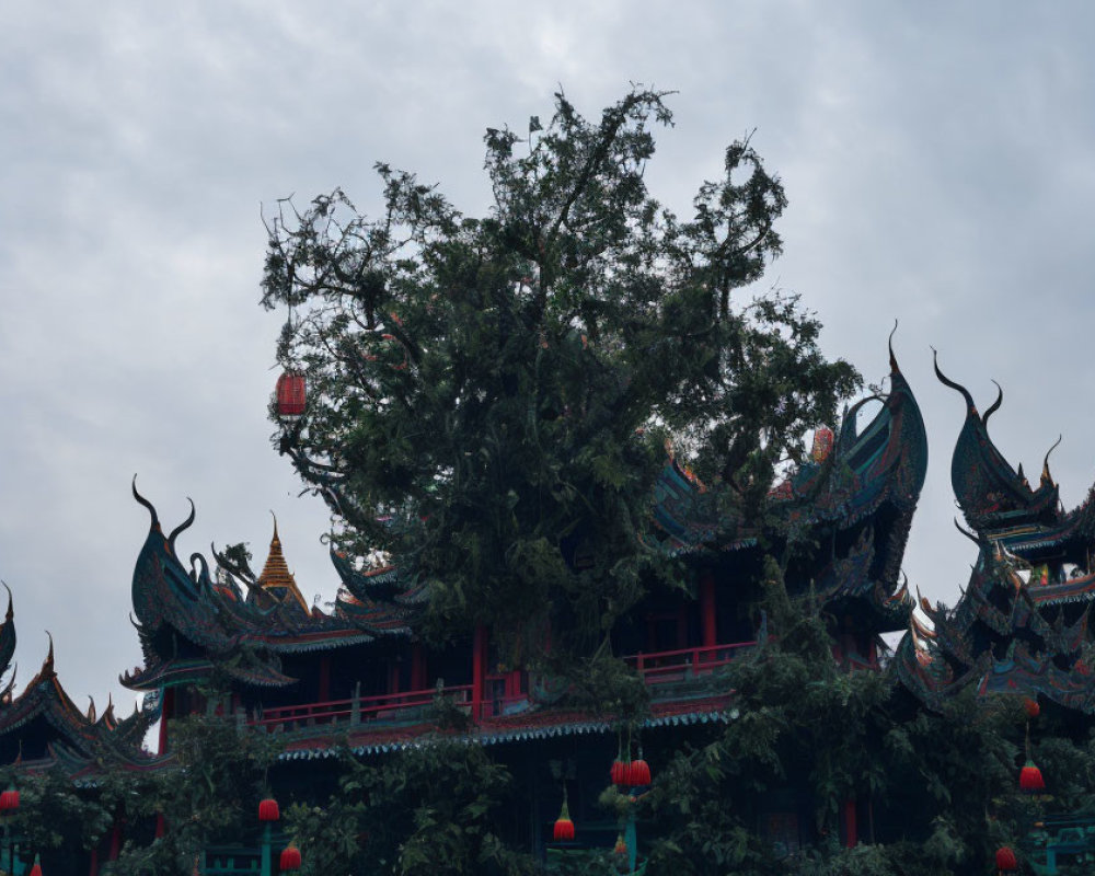 Ancient Chinese pagoda with red lanterns in tranquil setting