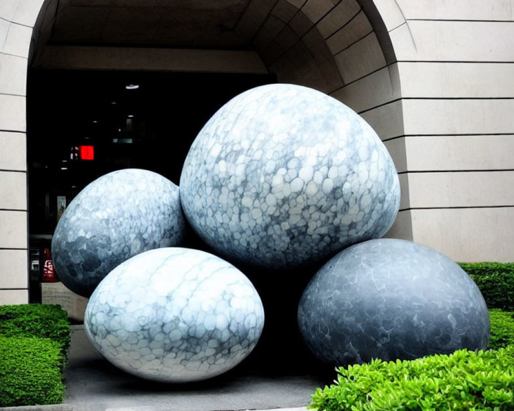 Patterned Spherical Sculptures in Arched Tunnel with Greenery