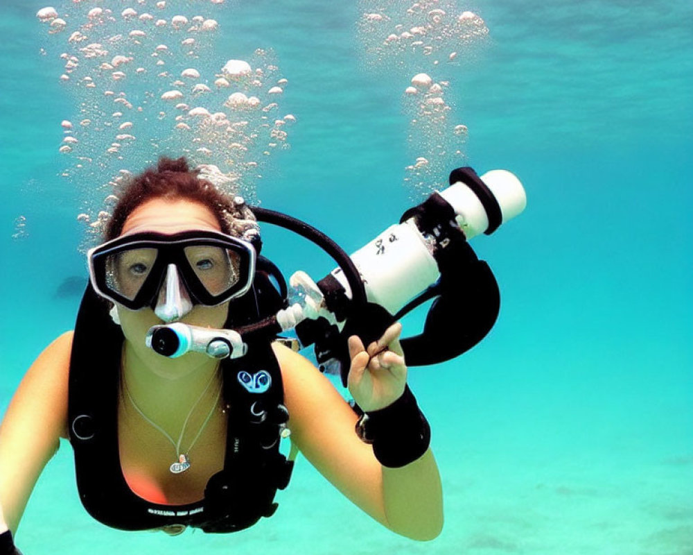 Underwater Diver with Snorkeling Gear Surrounded by Bubbles