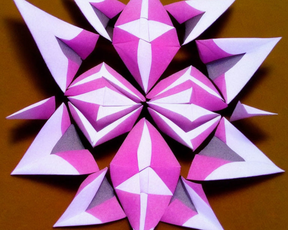 Symmetrical Pink and White Paper Star Design