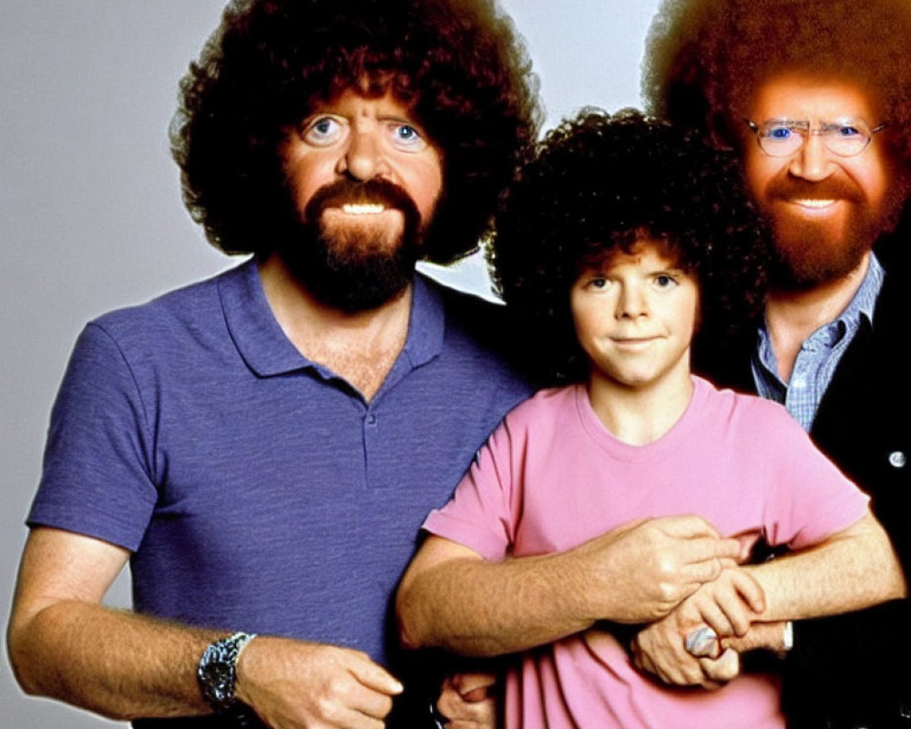 Three People with Curly Hair Posing Together in a Group Shot