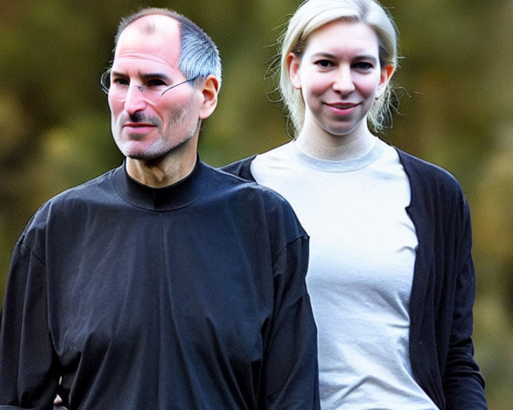 Two individuals in different outfits walking outdoors