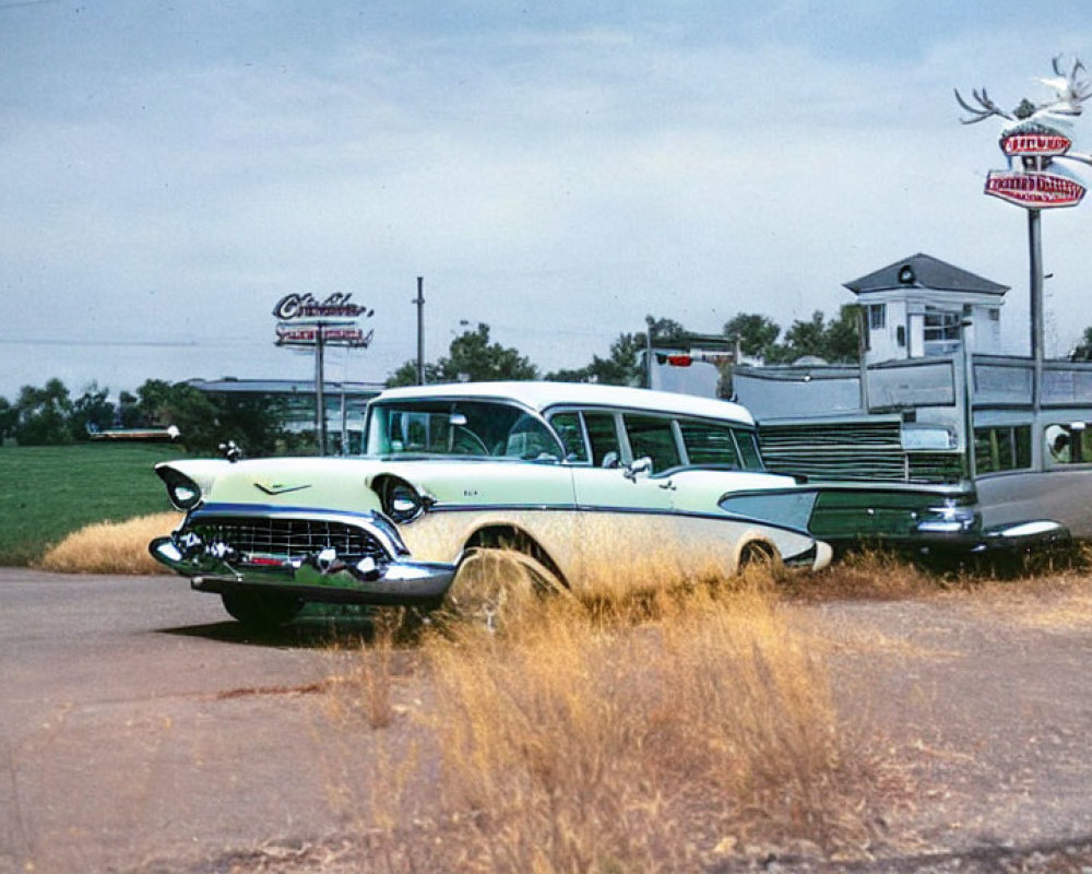 Vintage Turquoise and White Chevrolet at Classic Diner with Neon Signs