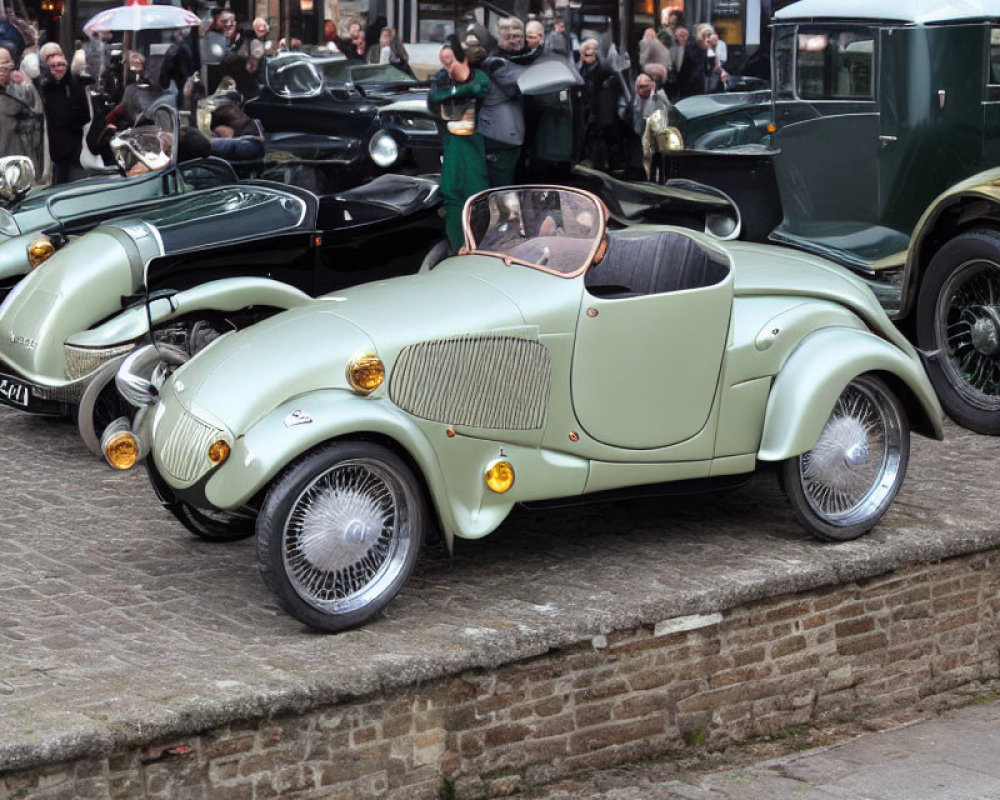 Classic Cream Sports Car Surrounded by Vintage Cars and Attendees