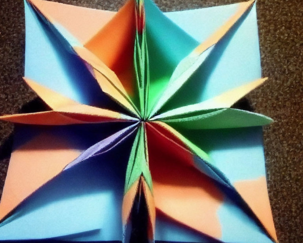 Symmetrical Modular Origami Star in Blue, Green, Orange, Purple