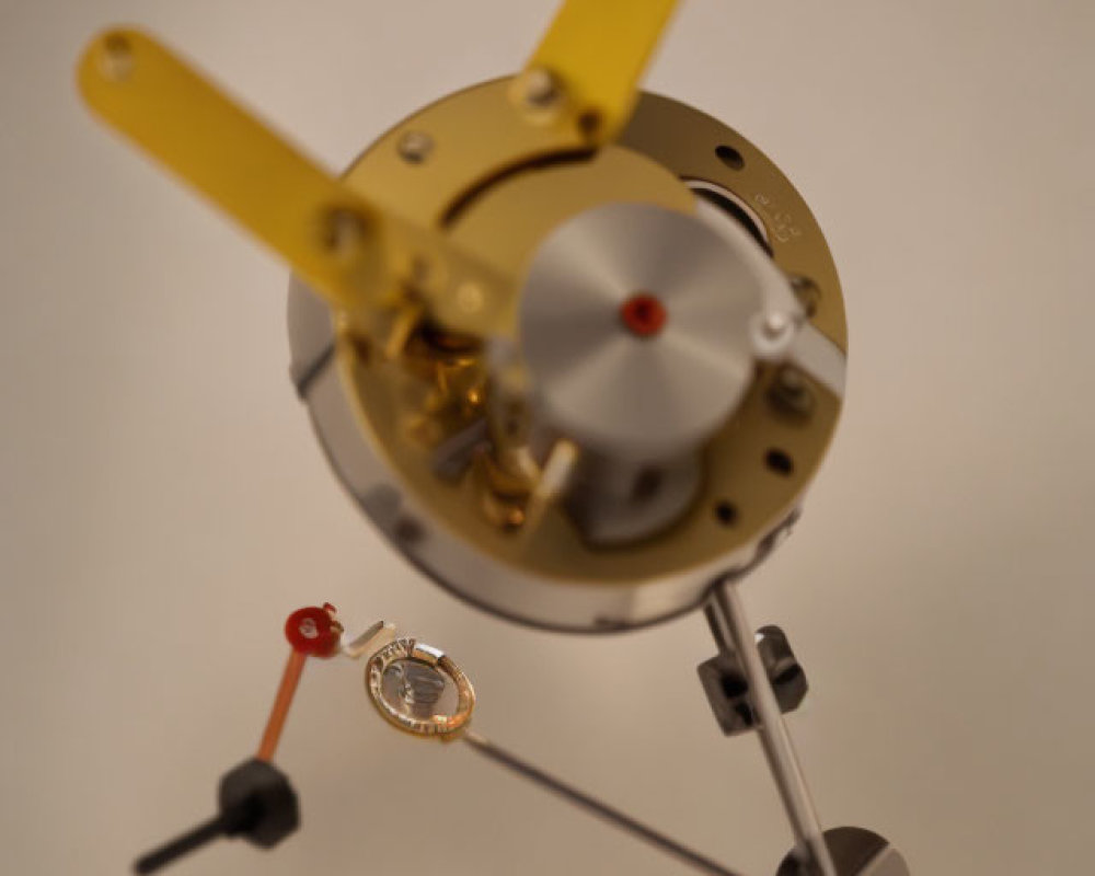 Detailed close-up of blurred clock hands and intricate gears in clock mechanism