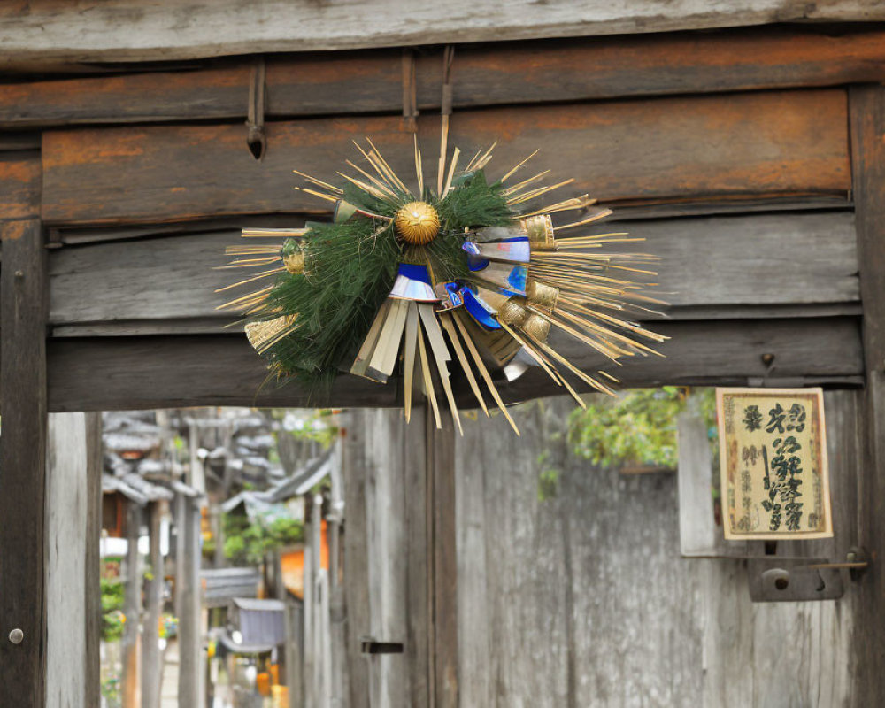 Traditional Japanese New Year Shimekazari on Wooden Gate with Blurred Alleyway