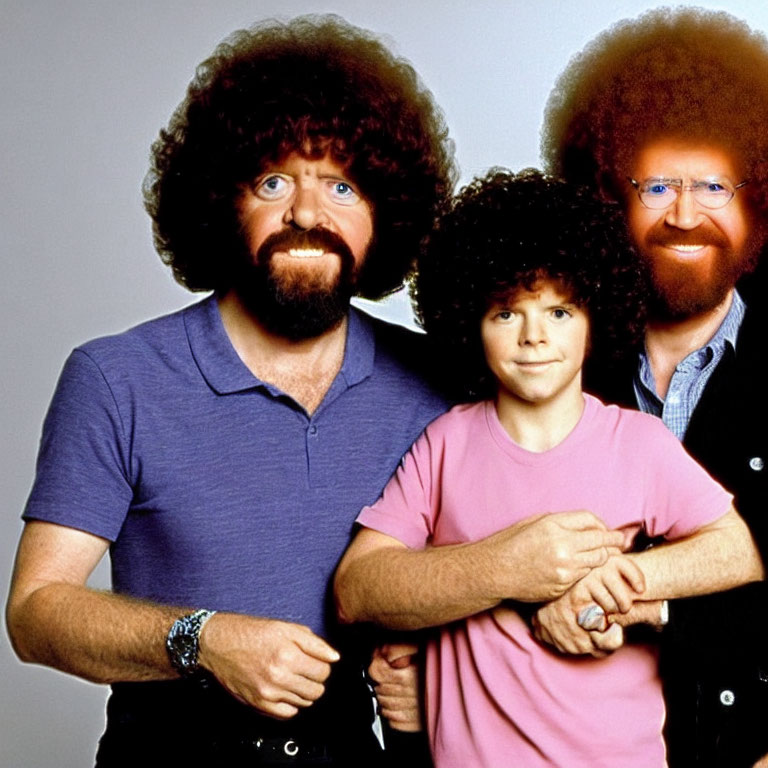 Three People with Curly Hair Posing Together in a Group Shot