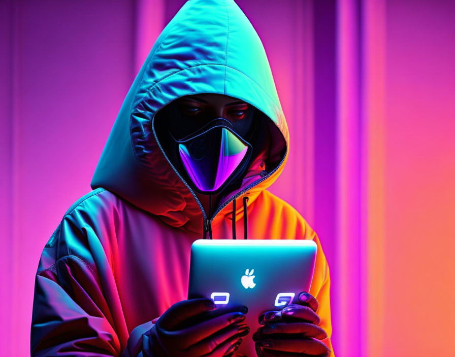 Hooded person with face mask on tablet under neon lights