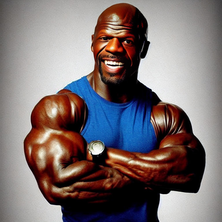 Muscular person in blue sleeveless top flexing arms on gray background