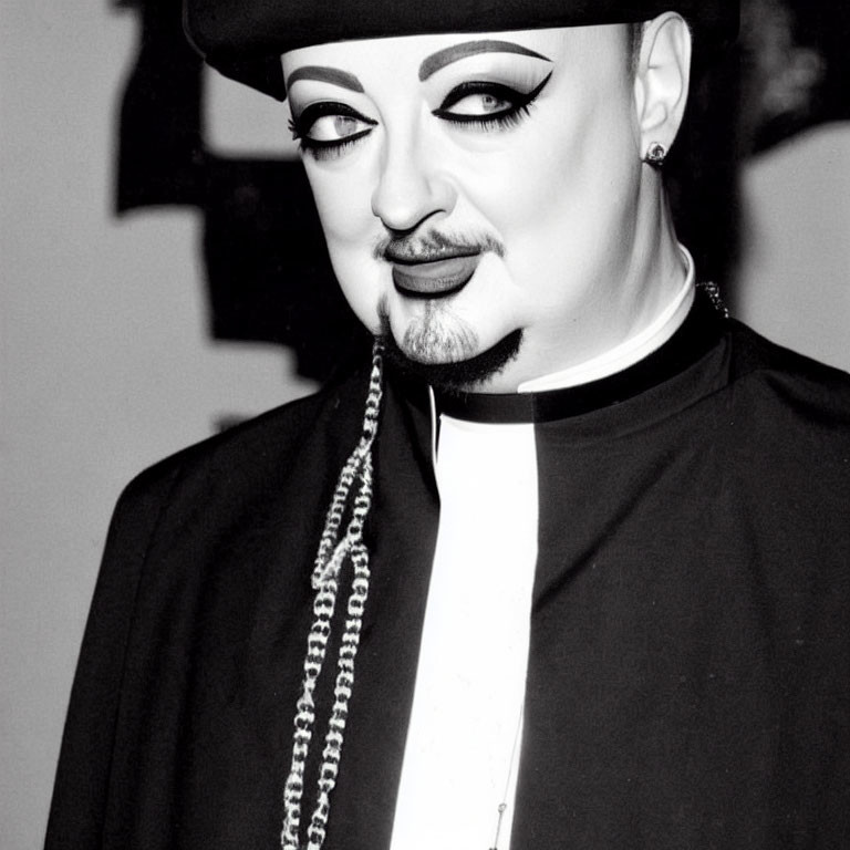 Dramatic makeup with black hat and priest-like collar portrait