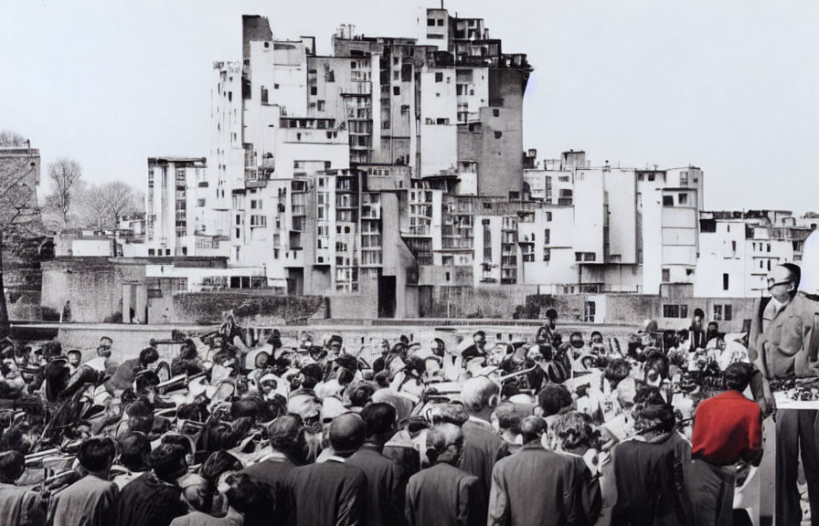 Vintage crowd photo with speaker and unique architecture