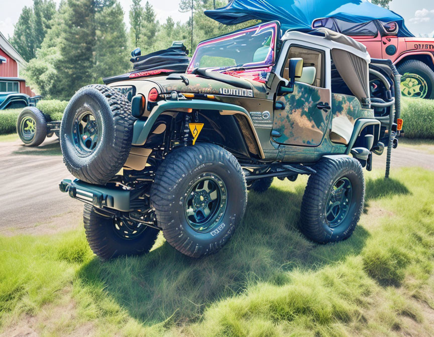 Customized Off-Road Jeep with Oversized Tires and Camouflage Paint Job