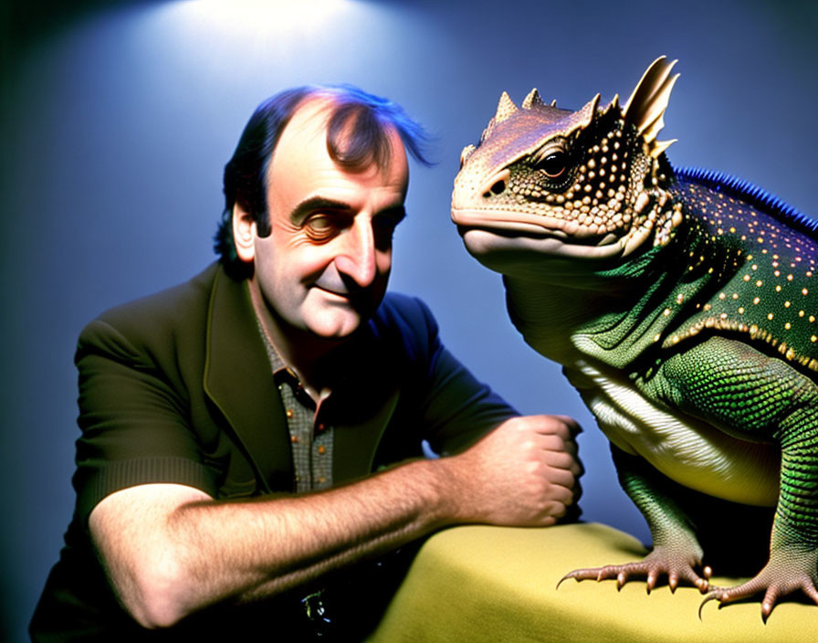 Man Smiling with Colorful Lizard on Yellow Surface