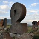 Large Metallic Sculptures of Numbers in a Field