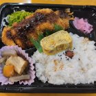 Plate of Food: Sunny-Side-Up Eggs, Oatmeal, Fried Chicken, Radish,