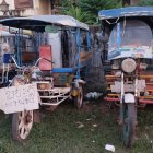 Colorful Tuk-Tuks on Cobblestone Street with Chrome Detailing